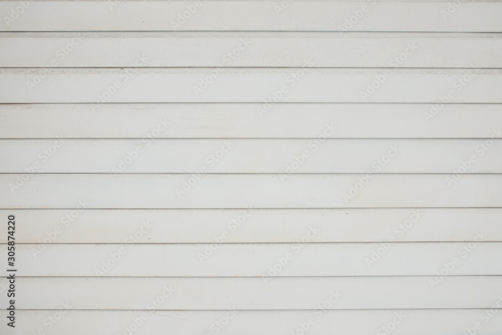 the siding is white. white striped background texture. building material-white siding. the siding is white. white striped background texture. building material-white siding.