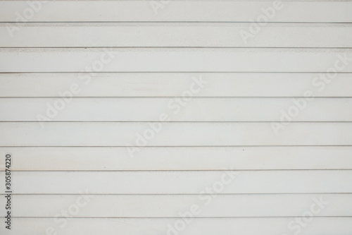 the siding is white. white striped background texture. building material-white siding.