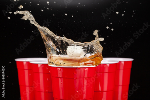 The arrangement of red plastic cups for game of beer pong