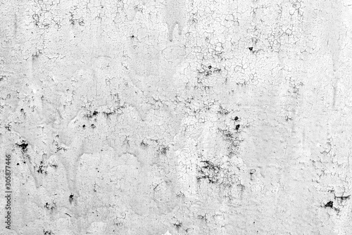 Metal texture with scratches and cracks which can be used as a background © chernikovatv