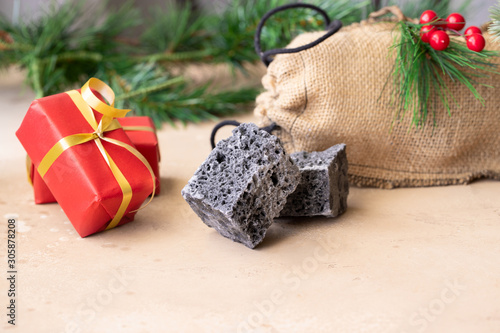 Foto Christmas coal for bad kinds and gifts for good children for Christmas  tradition in most countries