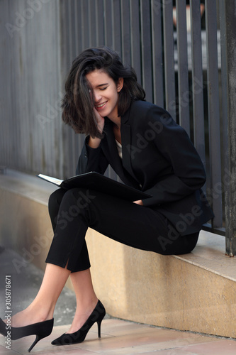 Portrait of business woman smiling outdoor