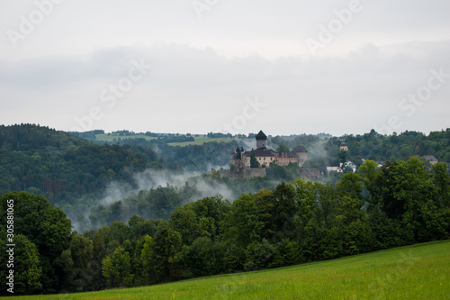 castle Sovinec  in the mists, Czech republic photo