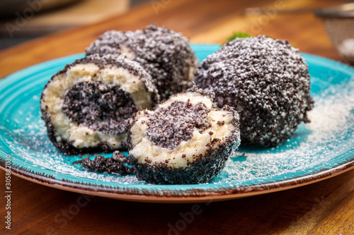 sweet dumplings with poppy seeds and icing sugar