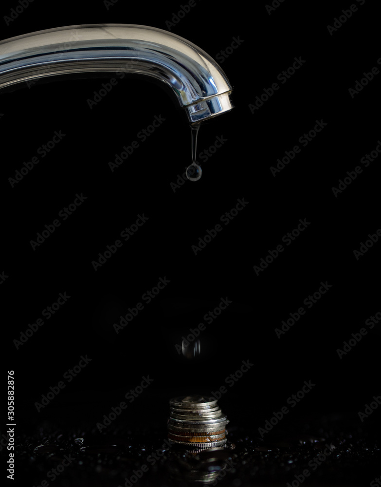 Water dripping from a faucet for money Water dripping from a faucet for money