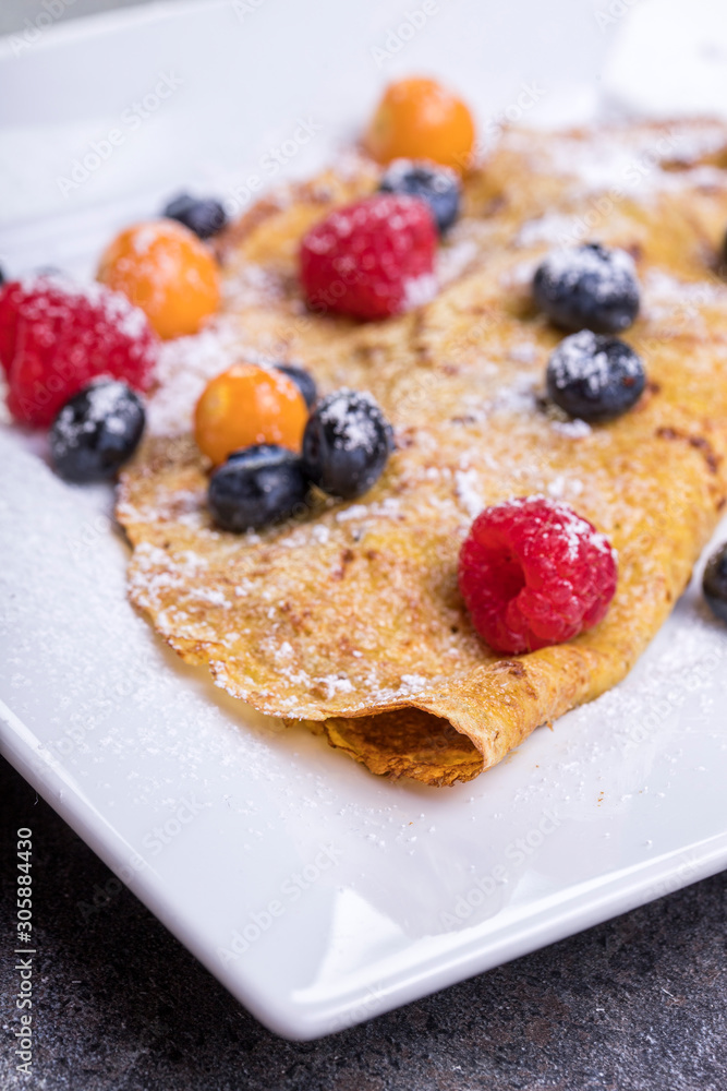 Tasty crepes with blueberries. French crepes Tasty crepes with blueberries. French crepes