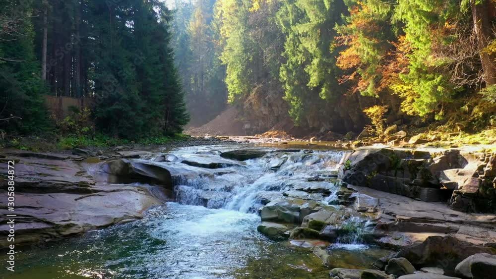 mountain river flowing between rocky shores in Carpathians mountains, Ukraine