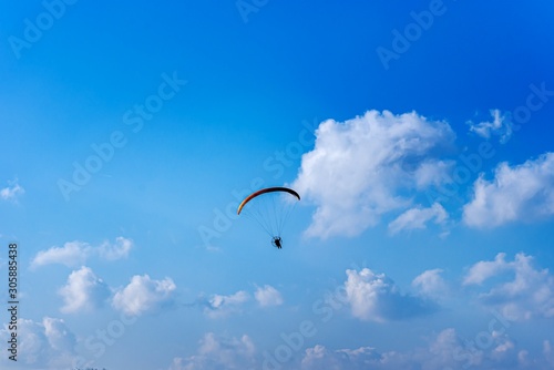 Parachute on a sky background . Motor-paraplane 