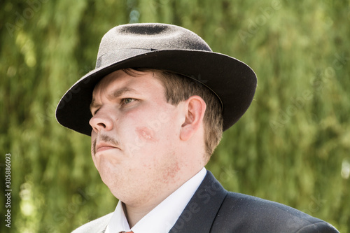portrait of a man in hat