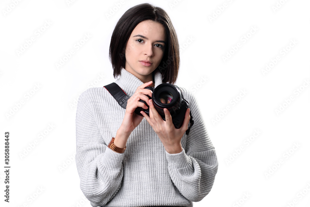 Young woman with photo camera. Isolated over white background