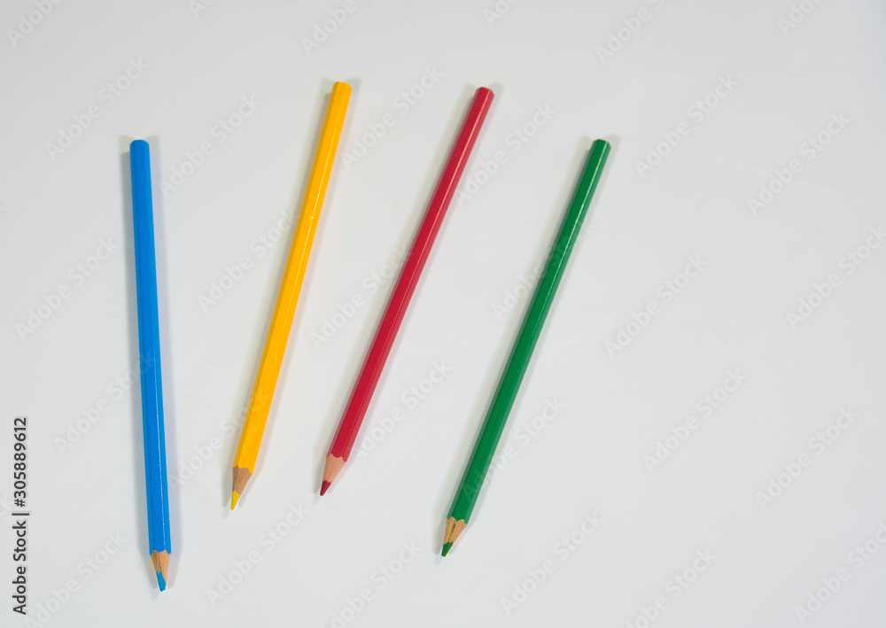 Four Color pencil on a white background Blue yellow red green Color Four Color pencil on a white background Blue yellow red green Color
