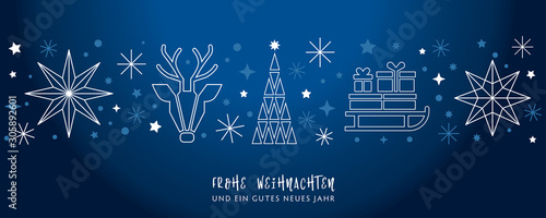 Weihnachtsgruss blauer Hintergrund - Sterne, Weihnachtsbaum, Rentier und Geschenke auf Schlitten - deutsch photo