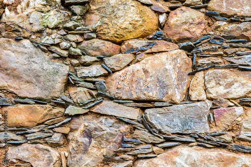 Fototapeta Naklejka Na Ścianę i Meble -  fondo de piedra con nasa marrón
