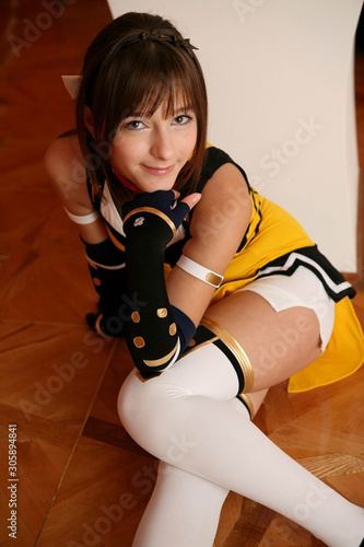 Photography Beautiful anime doll girl in pink dress on yellow