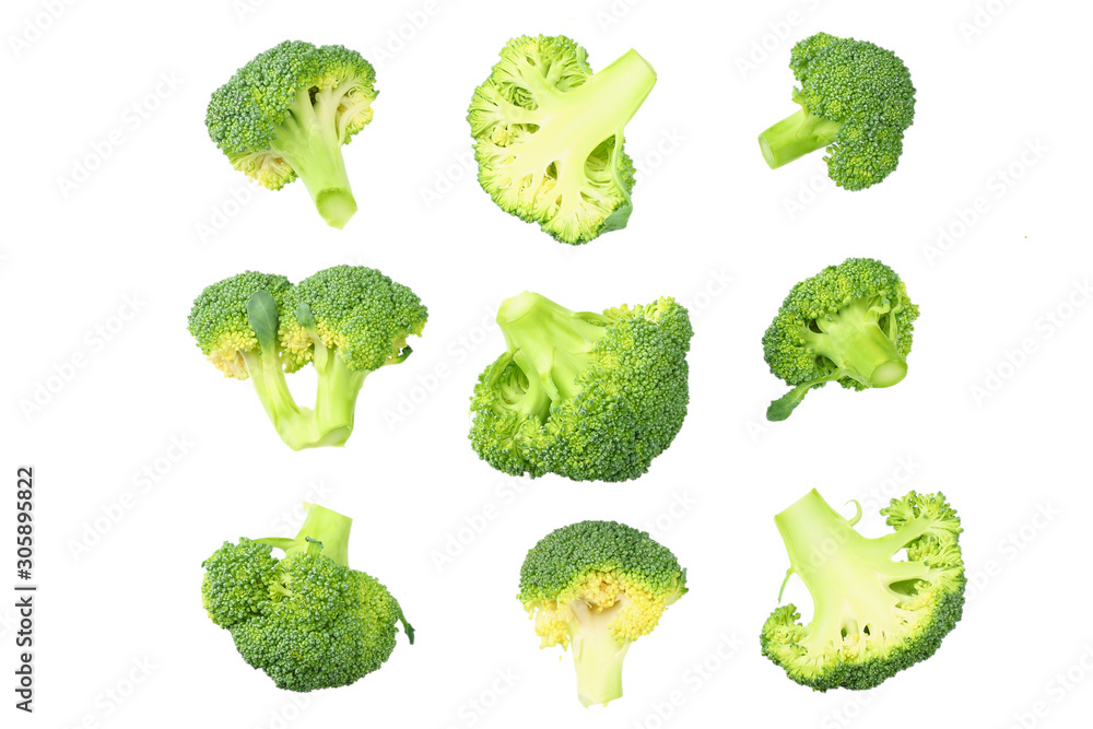 green broccoli with slices and leaves isolated on white background. top view green broccoli with slices and leaves isolated on white background. top view