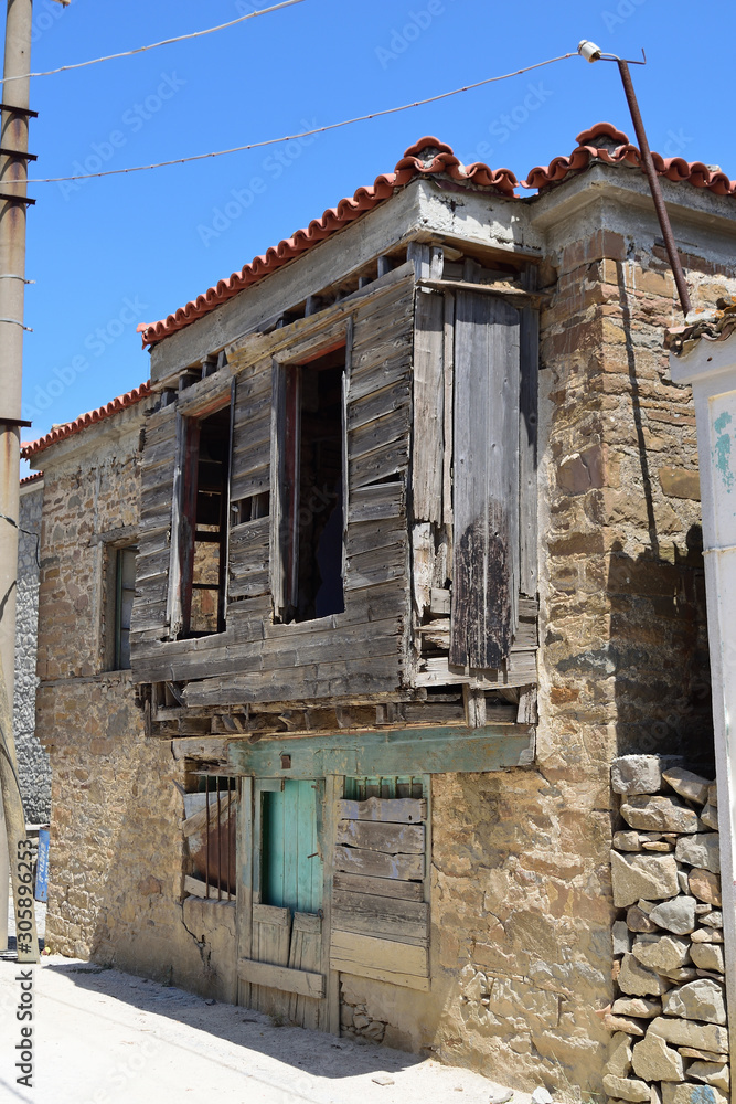 Ruined house in the abandoned Greek village Derekoy (Schinoudi) - turkish aegean island Gokceada