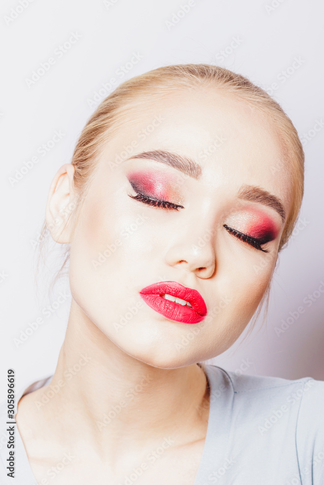 Portrait of beautiful woman with make up, studio shoot Portrait of beautiful woman with make up, studio shoot
