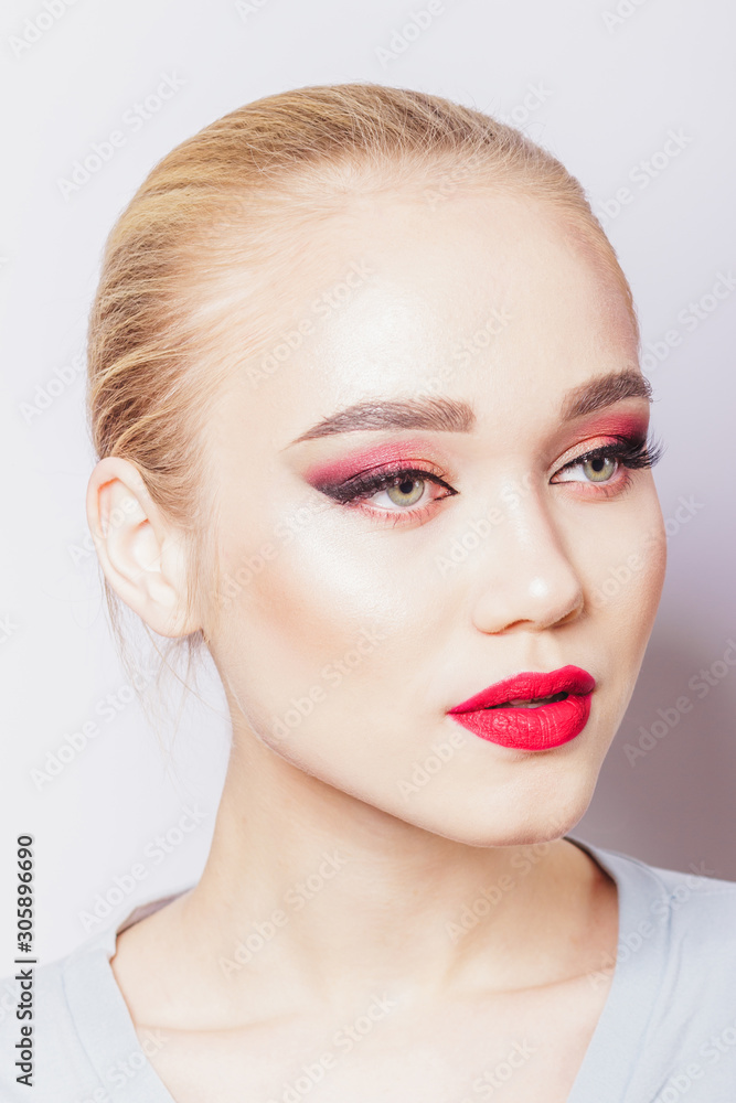 Portrait of beautiful woman with make up, studio shoot Portrait of beautiful woman with make up, studio shoot