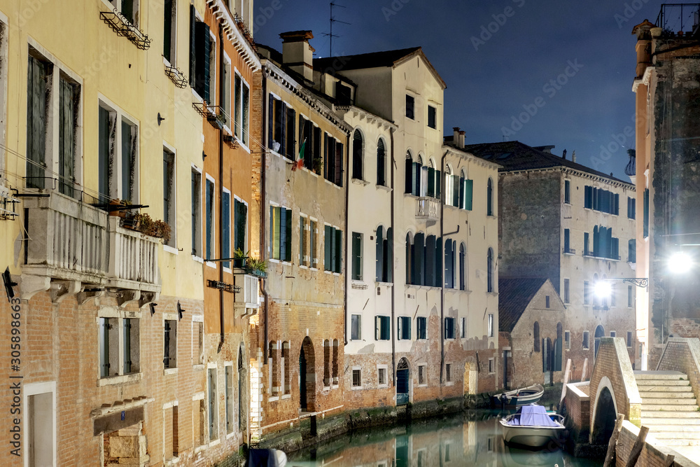 Night view of a traditional Venetian house facades