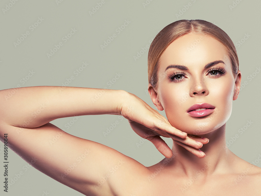 Naklejka premium Woman beauty face hand touching skin healthy skin natural make up female spa