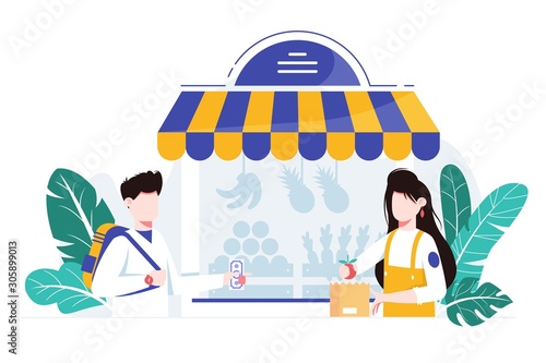 Customer making a purchase at local grocery shop. Helpful shopkeeper packs fresh fruit, vegetables and greenery.