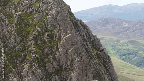 Climbers rock climbing on Cadir Idris photo