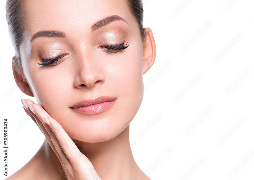 Beautiful woman face closed eyes hand manicure nails natural make up healthy skin close up beauty eyes
