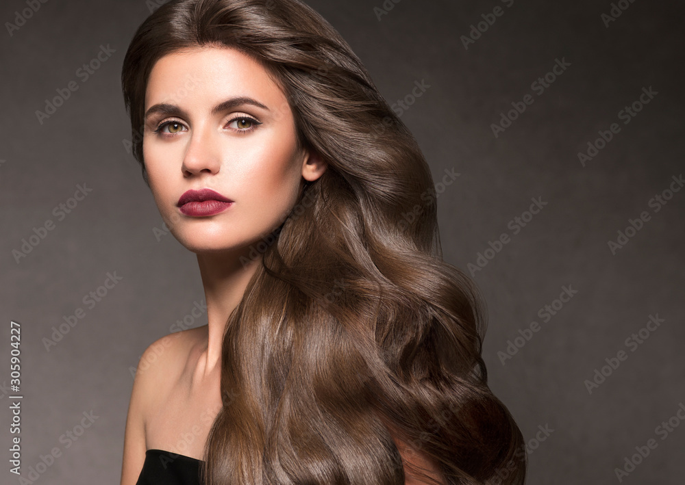 Beautiful brunette hair woman long curly hairstyle natural makeup Beautiful brunette hair woman long curly hairstyle natural makeup