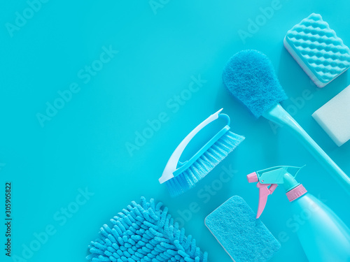 cleaning tools product supplies layout isolated on blue with copy space for template