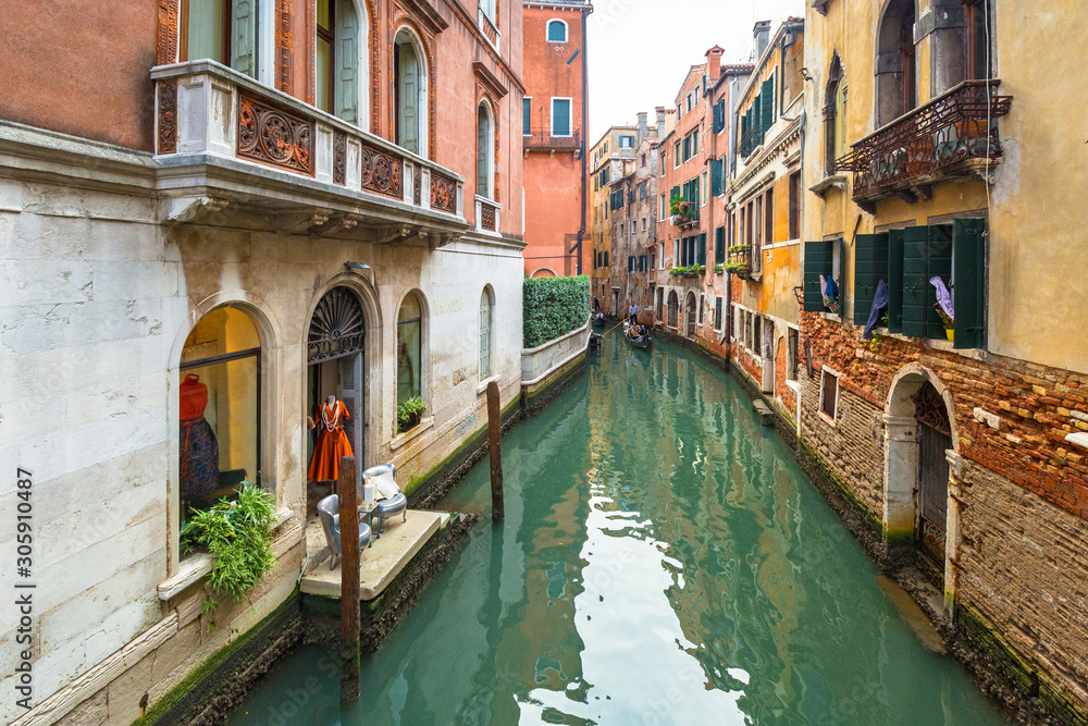 Canals of Venice city with traditional colorful architecture, Italy