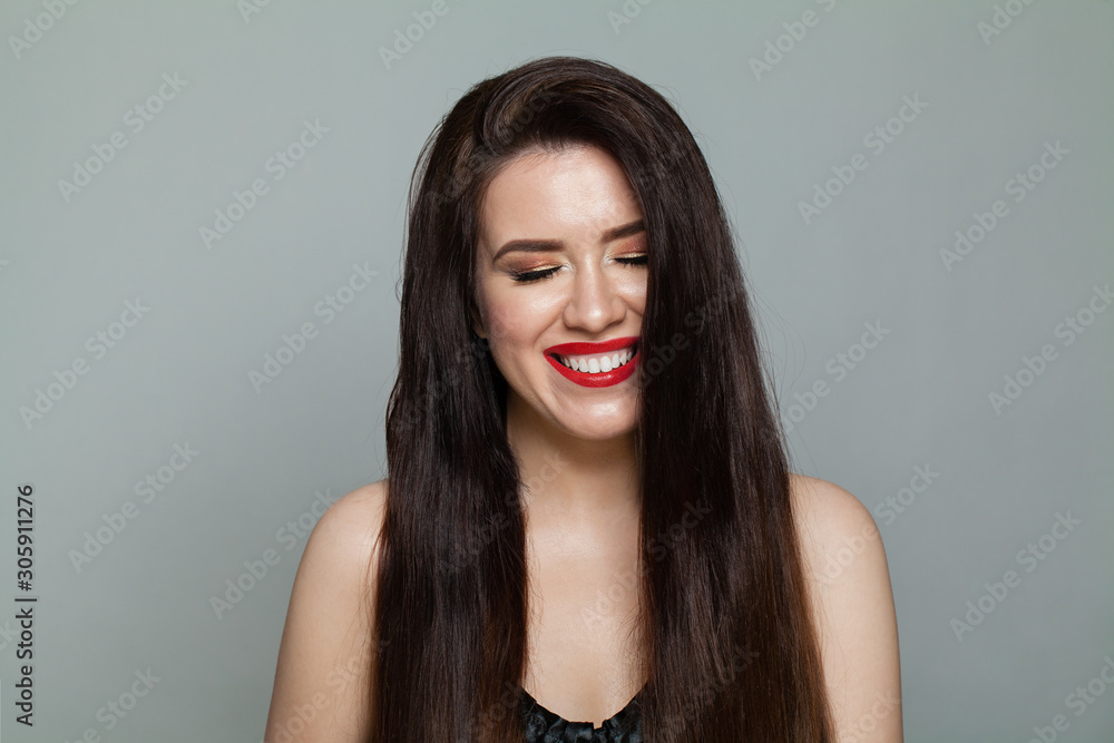 Laughing woman. Pretty brunette model. emotional portrait, positive facial expression Laughing woman. Pretty brunette model. emotional portrait, positive facial expression