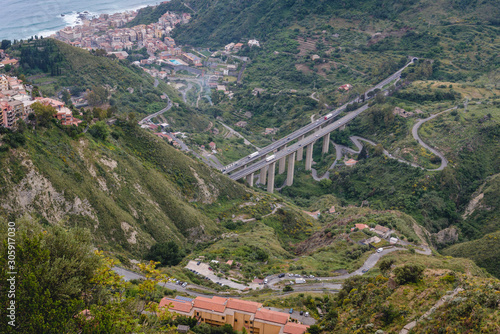 View on the viaduct of A18 motorway from Castelmola, small town on Sicily Island, Italy photo
