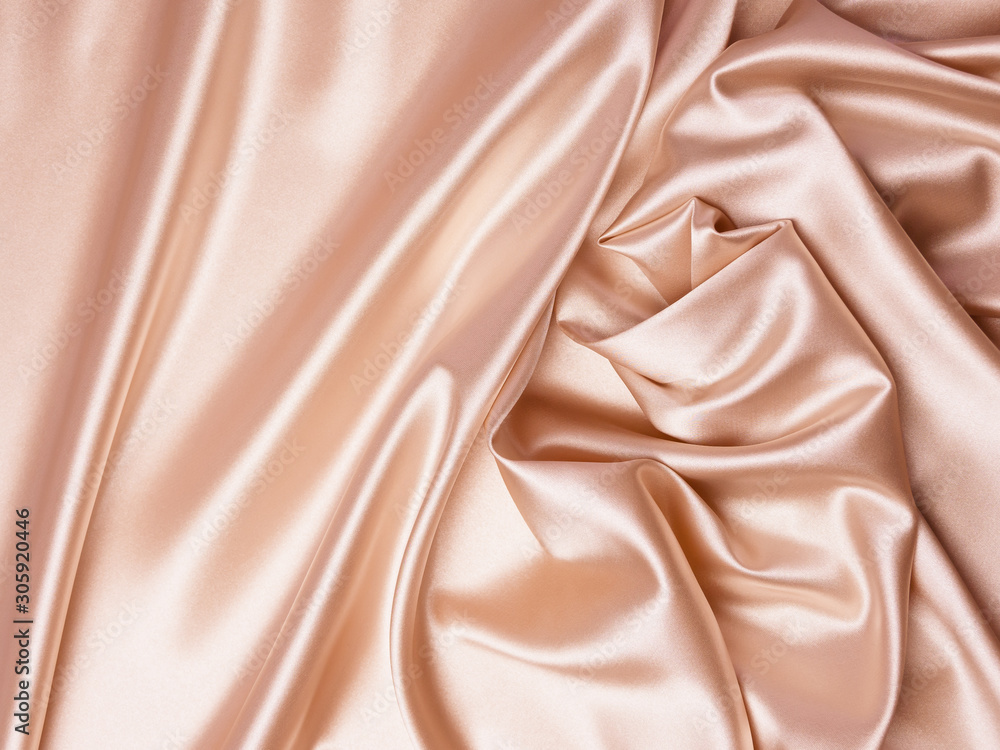 Fototapeta premium Beautiful smooth elegant wavy beige / light brown satin silk luxury cloth fabric texture, abstract background design. Copy space. Card or banner