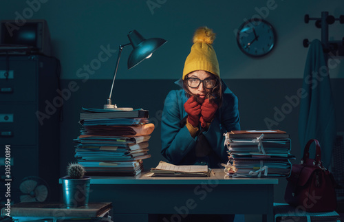 Woman freezing in the office photo
