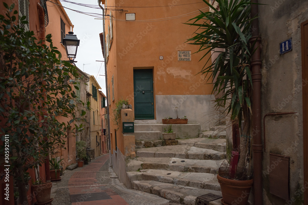 Fototapeta premium Streets of the French city of Menton on a cloudy day