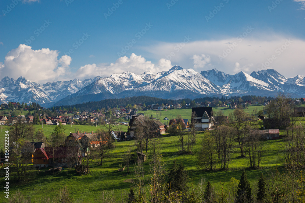 Panorama of snowy Tatra mountains and Podhale village Bukowina Tatrzanska, Malopolskie, Poland