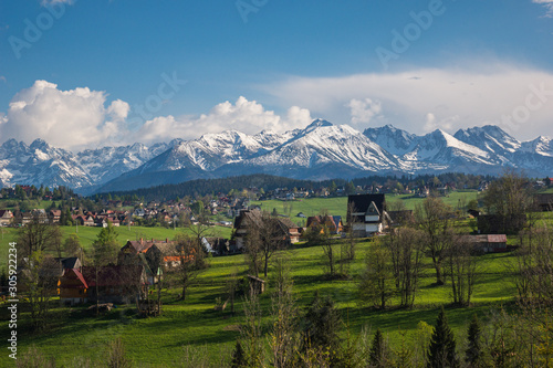 Fototapeta Naklejka Na Ścianę i Meble -  Panorama of snowy Tatra mountains and Podhale village Bukowina Tatrzanska, Malopolskie, Poland