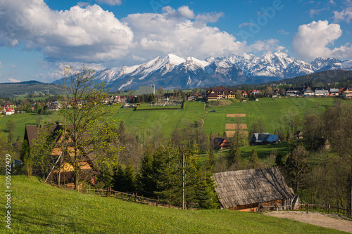 Panorama of snowy Tatra mountains and Podhale village Bukowina Tatrzanska, Malopolskie, Poland