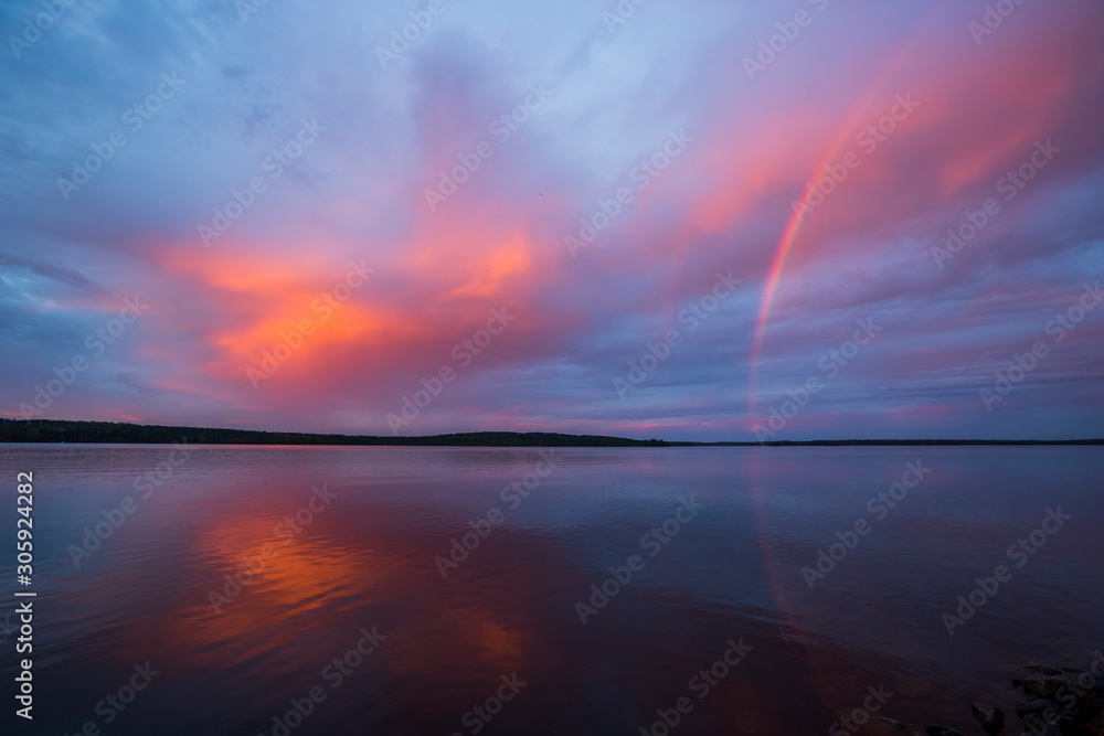 Autumn sunset with rainbow in Lapland, Finland Autumn sunset with rainbow in Lapland, Finland