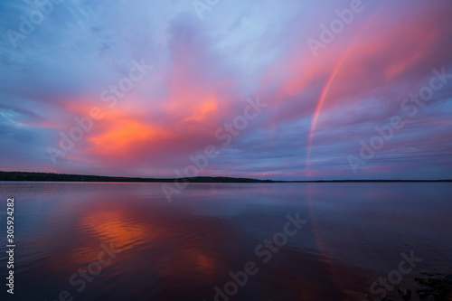 Autumn sunset with rainbow in Lapland, Finland
