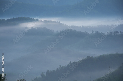 A picture of beautiful sky and cover foggy of layer mountain before sunrise, Thailand.