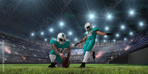 American football players in professional sport stadium. © VIAR PRO studio