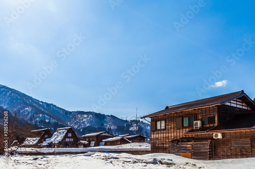 The view around the Shirakawago village, Antique style wooden house, World heritage village during the winter season with the clear blue sky and snow, Gifu, Japan