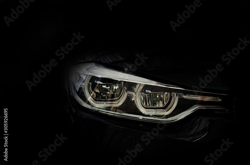 Luxury car headlight details © khunkornStudio