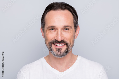 I'm hot. Closeup photo of handsome aged man good mood beaming smile looking mirror enjoy mature wrinkles appearance wear white t-shirt isolated grey color background
