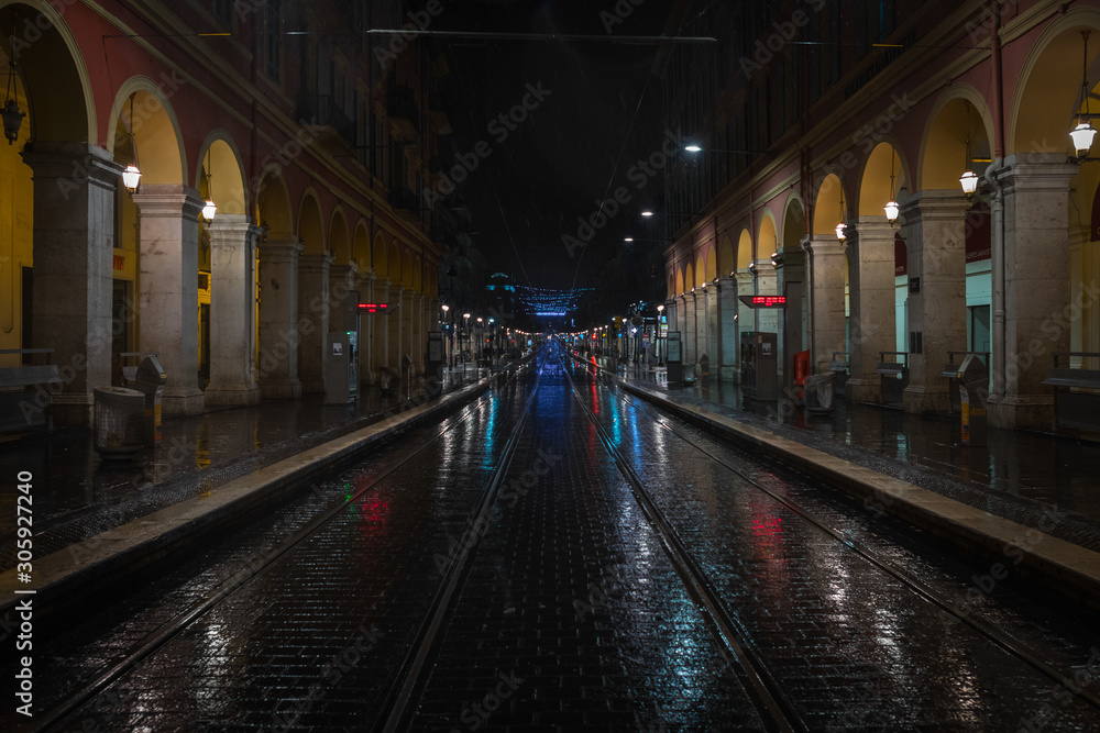 Rainy streets of Nice in the evening