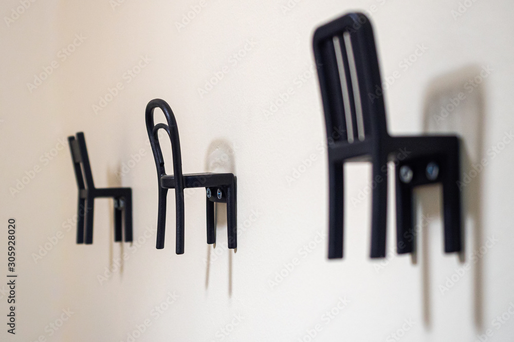 Clothes hanger chair on wall for decor