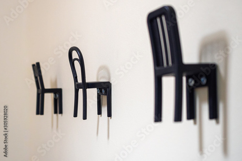 Obraz na płótnie Clothes hanger chair on wall for decor w salonie