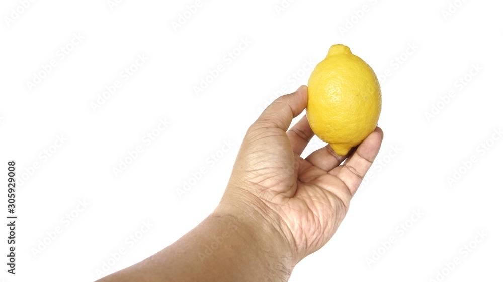 Image of a hand holding a lemon isolated on white background Image of a hand holding a lemon isolated on white background