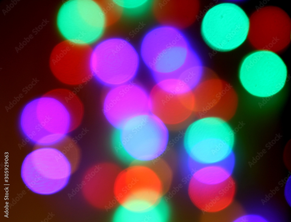Colorful bokeh lights on black background On christmas day. Colorful bokeh lights on black background On christmas day.